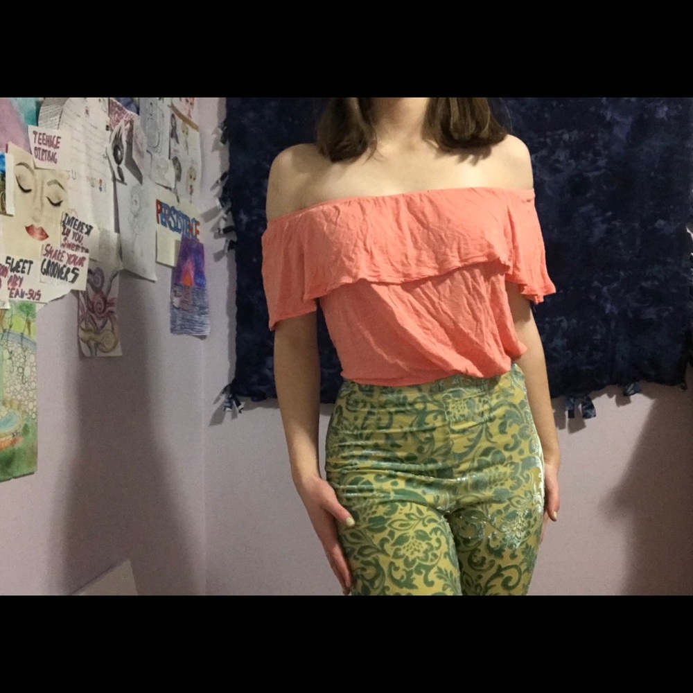off the shoulders peach shirt